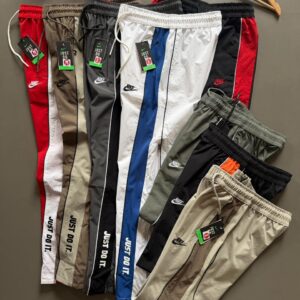 nike half chain bootcut track in crush lycra fabric